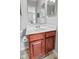 Bathroom vanity featuring a mirror and a white sink at 882 Lincoln Park W Dr, Greenwood, IN 46142