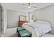 Cozy bedroom with carpet, ceiling fan, and natural light from a window at 882 Lincoln Park W Dr, Greenwood, IN 46142