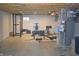 Spacious basement featuring workout equipment and a concrete floor at 10166 Ranford Blvd, Fishers, IN 46040