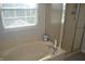 Bathroom featuring soaking tub and glass shower at 10166 Ranford Blvd, Fishers, IN 46040