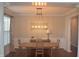 Elegant dining room with modern lighting and space for a large table at 10166 Ranford Blvd, Fishers, IN 46040
