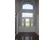 Stately entryway with decorative glass door and transom window at 10166 Ranford Blvd, Fishers, IN 46040
