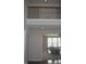 Second floor view of the living room below and an iron railing at 10166 Ranford Blvd, Fishers, IN 46040