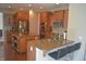 Modern kitchen features granite countertops, stainless steel appliances, and ample cabinet space at 10166 Ranford Blvd, Fishers, IN 46040