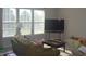 Bright living room with large windows and comfortable furnishings at 10166 Ranford Blvd, Fishers, IN 46040