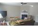 Cozy living room featuring a fireplace and neutral color palette at 10166 Ranford Blvd, Fishers, IN 46040