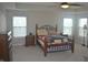 Spacious main bedroom features a tray ceiling, ceiling fan, and lots of natural light at 10166 Ranford Blvd, Fishers, IN 46040