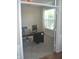 Well-lit home office with desk and window view at 10166 Ranford Blvd, Fishers, IN 46040