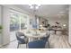 Open dining area with access to the backyard, seamlessly connecting to the living room at 10246 Liverpool Way, Indianapolis, IN 46236