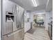Modern kitchen with stainless steel appliances, sleek countertops, and bright lighting at 10246 Liverpool Way, Indianapolis, IN 46236