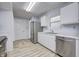 Functional kitchen with stainless steel appliances and ample cabinet space at 10246 Liverpool Way, Indianapolis, IN 46236