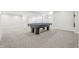 Finished basement with a pool table and recessed lighting at 1066 N Dogwood Way, Greenfield, IN 46140