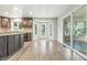Lovely kitchen boasts a bay window, stainless steel dishwasher, granite counters, and sliding glass doors at 1066 N Dogwood Way, Greenfield, IN 46140