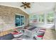 Enclosed sunroom with wood floors and plenty of natural light at 1066 N Dogwood Way, Greenfield, IN 46140