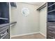 Walk-in closet with custom shelving and storage for clothing, shoes, and accessories at 1066 N Dogwood Way, Greenfield, IN 46140