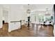 Elegant foyer with hardwood floors, a grand staircase, and a stylish chandelier at 11137 Peppermill Ln, Fishers, IN 46037