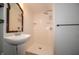 A modern bathroom with a shower stall and a decorative sink at 11218 Exchange St, Indianapolis, IN 46259