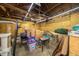 Messy garage with a variety of tools and storage items at 11218 Exchange St, Indianapolis, IN 46259