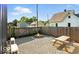 Backyard features a fire pit, picnic table, and a cozy gravel area at 1324 E 9Th, Indianapolis, IN 46202