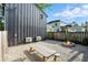 Private backyard with a fire pit, picnic table, and newly installed AC Units at 1324 E 9Th, Indianapolis, IN 46202