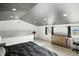 Spacious bedroom with slanted ceilings, offering ample natural light, and modern accents at 1324 E 9Th, Indianapolis, IN 46202