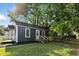 Charming home showcasing a well-manicured lawn and inviting front entry at 1324 E 9Th, Indianapolis, IN 46202