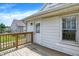 This home has a spacious back deck perfect for relaxing or entertaining with an exterior door at 1411 N Linwood Ave, Indianapolis, IN 46201