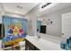 Bathroom with a shower curtain with a Baby Shark theme at 1460 Boots Trl, Greenfield, IN 46140