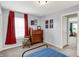This cozy bedroom offers a comfortable retreat with soft carpet flooring and a calming color palette at 1460 Boots Trl, Greenfield, IN 46140