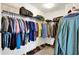 Spacious walk-in closet with abundant shelving and racks for clothes and storage at 1460 Boots Trl, Greenfield, IN 46140