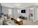 Inviting living room with comfortable seating and a view of an adjacent room at 1460 Boots Trl, Greenfield, IN 46140