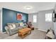 Cozy living room features plush seating, an area rug, and neutral decor at 1460 Boots Trl, Greenfield, IN 46140