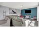 Stylish living room with hardwood flooring, comfortable seating, modern decor and large television at 1460 Boots Trl, Greenfield, IN 46140