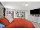 Bright main bedroom with light-colored furniture, a vanity, and ensuite bath access at 1460 Boots Trl, Greenfield, IN 46140