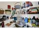 Organized pantry with wire shelving filled with food items and storage containers at 1460 Boots Trl, Greenfield, IN 46140