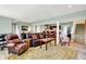 Finished basement with comfortable seating, wet bar, and entertainment space at 14737 Macduff Dr, Noblesville, IN 46062