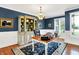 Charming home office featuring custom built-ins, a large desk, and natural light from the window at 14737 Macduff Dr, Noblesville, IN 46062