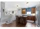 Bright kitchen with a center island, stainless steel appliances, and plenty of natural light at 15372 Black Gold Ct, Noblesville, IN 46060