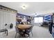 Spacious room with wall decor, ceiling fan, game table, and carpet at 15372 Black Gold Ct, Noblesville, IN 46060