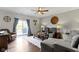 Inviting living room with sliding doors to the back, featuring hardwood floors and a cozy seating area at 15372 Black Gold Ct, Noblesville, IN 46060