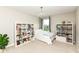 Bright bedroom with shelving, chandelier, and a window bringing in natural light at 15984 Conductors Dr, Westfield, IN 46074