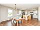 Charming dining room with adjacent kitchen, perfect for gatherings and entertaining at 15984 Conductors Dr, Westfield, IN 46074