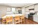 A spacious kitchen with an island, stainless steel appliances, and ample counter space at 15984 Conductors Dr, Westfield, IN 46074