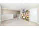 Loft area with a storage shelf with toys, an open staircase, and recessed lighting at 15984 Conductors Dr, Westfield, IN 46074