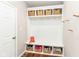 Mudroom area with storage cubbies, coat hooks, and bench for organization at 15984 Conductors Dr, Westfield, IN 46074