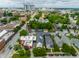 This aerial perspective shows the property in a neighborhood with vibrant city views, lush greenery, and a blend of urban living at 1610 N Alabama St, Indianapolis, IN 46202