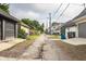 A look at the back alley that has garages lining the side at 1610 N Alabama St, Indianapolis, IN 46202
