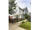 Charming two-story home with a landscaped front yard and inviting front porch swing at 1610 N Alabama St, Indianapolis, IN 46202