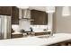Bright kitchen with stainless steel appliances, white countertops, and a tiled backsplash at 1610 N Alabama St, Indianapolis, IN 46202