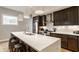 Spacious kitchen with a large island, stainless steel appliances, and modern pendant lighting at 1610 N Alabama St, Indianapolis, IN 46202